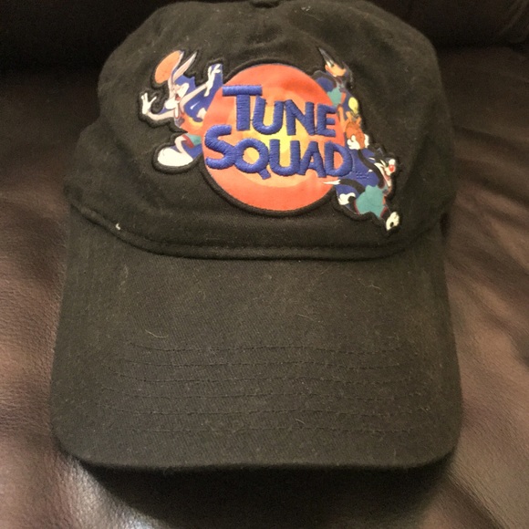 Two dad hats newer space jam hat and a olive green adidas hat